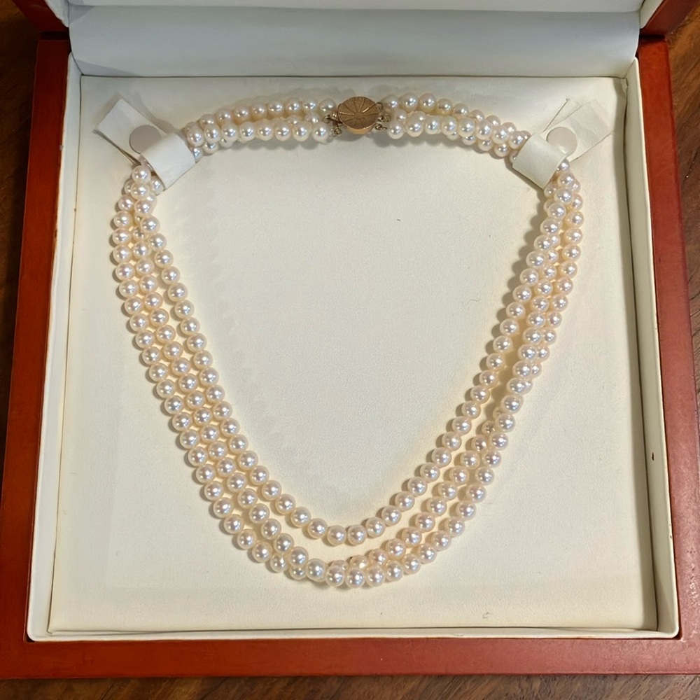 One, three strand, cultured freshwater Pearl Necklace.
